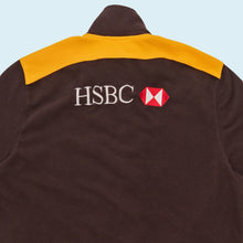 Lade das Bild in den Galerie-Viewer, Puma x AFL On Field Fleece Jacke "Tasmania Hawks", braun/gelb, XL