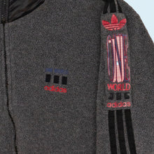 Lade das Bild in den Galerie-Viewer, Adidas Polartech Fleece Jacke "One World" 90er Made in Tunisia, grau, L
