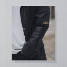 Lade das Bild in den Galerie-Viewer, Adidas Mantel &quot;Olympia St. Moritz 1948&quot; echtes Leder Made in Turkey 80er/90er, schwarz, XL
