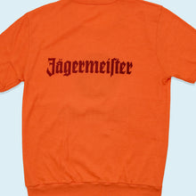 Lade das Bild in den Galerie-Viewer, Trevira T-Shirt Jägermeister 70er, orange, S/M
